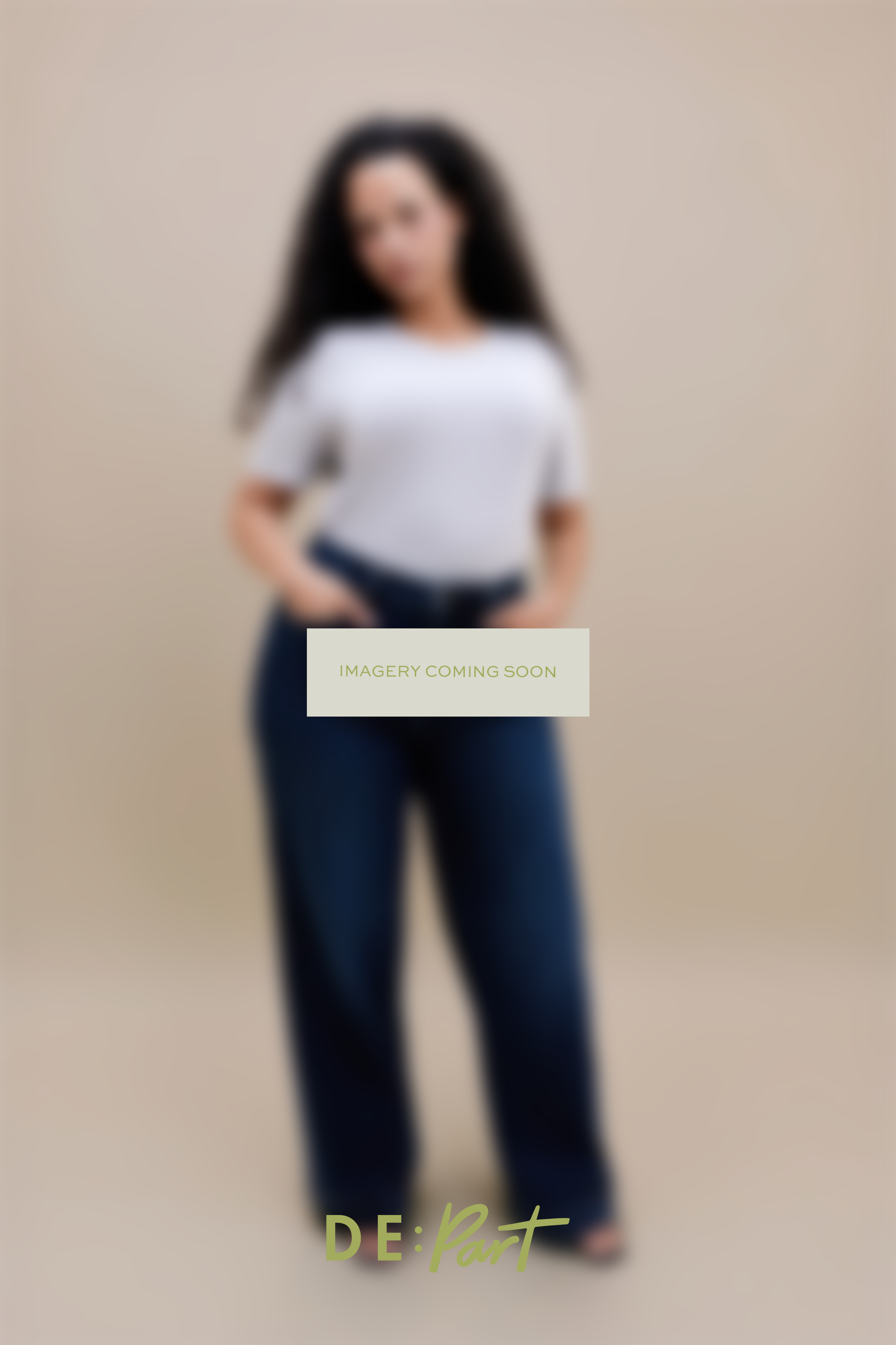 A blurred studio photo of a person wearing a white short-sleeve top and dark blue wide-leg pants against a warm beige background, with a central 'IMAGERY COMING SOON' overlay and 'DE:Part' branding at the bottom.