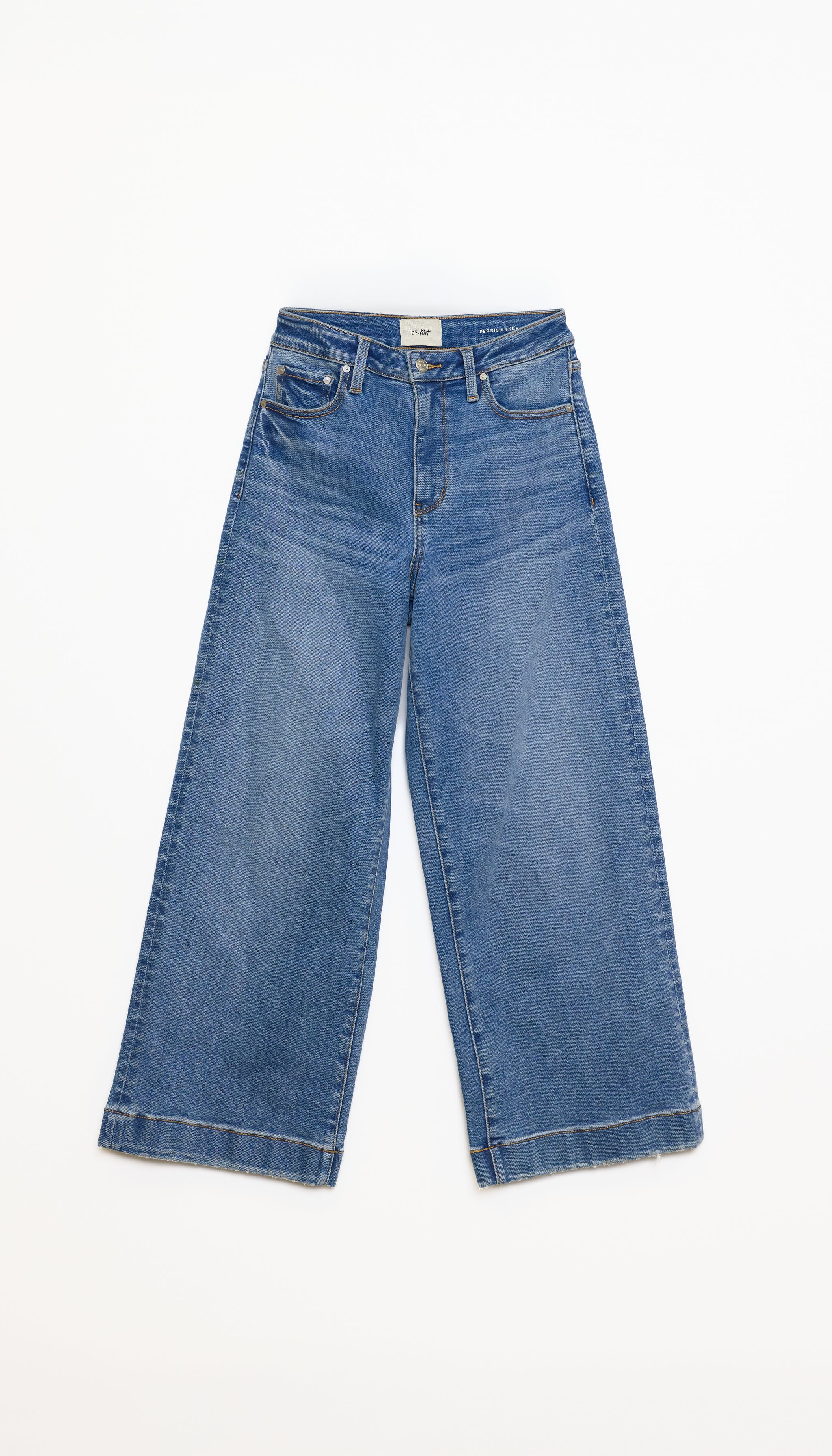 A pair of medium-wash blue denim jeans with a wide-leg, cropped silhouette, laid flat against a clean white background.