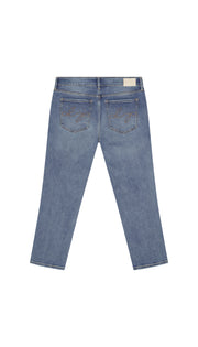 Medium blue skinny jeans backside flat on a white background