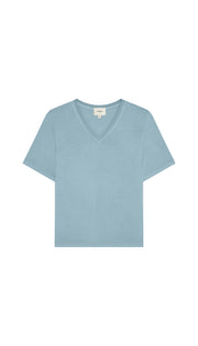 Light blue V-neck sweater on a white background