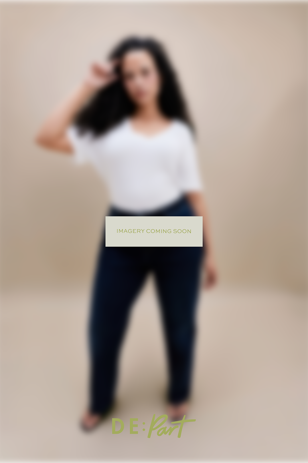 A model wearing a white t-shirt and dark blue jeans is shown in a blurred studio setting with a central 'IMAGERY COMING SOON' overlay and 'DE:Part' branding at the bottom.